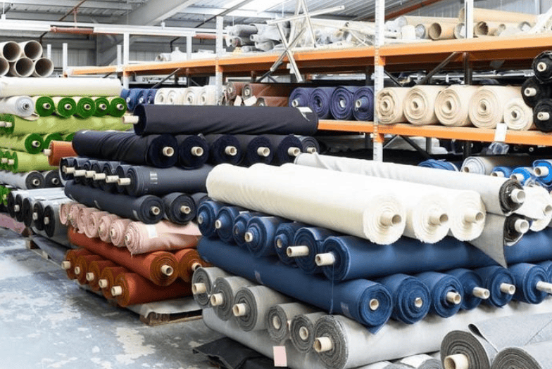 Fabric dyeing and treatment services for custom clothing manufacturer