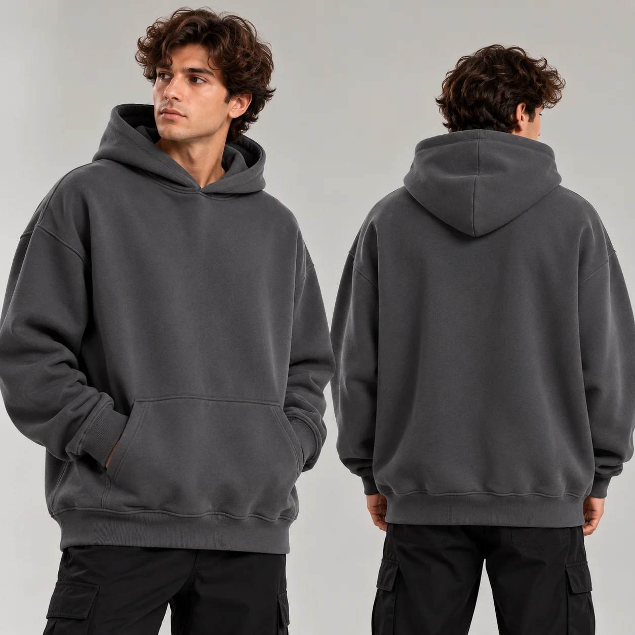 Custom men oversized hoodie in charcoal grey with relaxed fit, kangaroo pocket, hood, and ribbed cuffs and hem